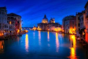 Venice city at dusk with Santa Maria della Salute Basilica, Italy photo