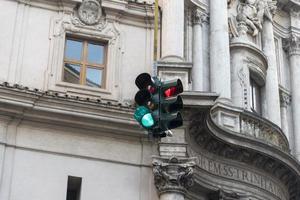 Traffic lights on the background of the city house. photo