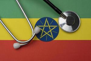 Ethiopia flag and stethoscope. The concept of medicine.