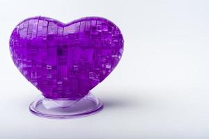 A three-dimensional heart on a white background. photo