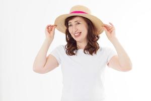 Summer beach holiday, vacation concept. Woman in hat and template blank t shirt isolated on white background. Copy space on tshirt and place for print. Sun skin care, wrinkles protection. Anti aging photo