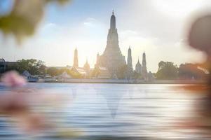 Beautiful view of Wat Arun Temple at sunset in Bangkok, Thailand photo