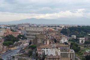 View of the Colosseum and Santi Luca e Martina. photo