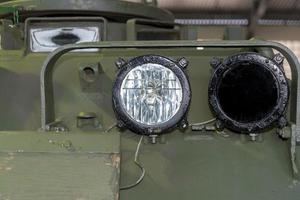 Round lantern in the armored vehicle of Russian military equipment. photo