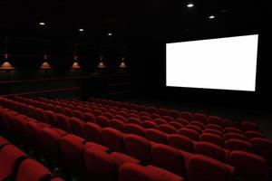 Empty cinema hall with red seats. Movie theater. photo