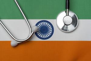 The flag of India and a stethoscope. The concept of medicine. photo