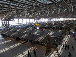 Suvarnabhumi BANGKOK THAILAND31 OCTOBER 2018In the airport passengers are walking to different areas of the airport. Suvarnabhumi Airport is Thailands main airport.0n BANGKOK THAILAND. photo