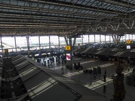 Suvarnabhumi BANGKOK THAILAND31 OCTOBER 2018In the airport passengers are walking to different areas of the airport. Suvarnabhumi Airport is Thailands main airport.0n BANGKOK THAILAND. photo