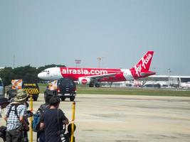 Don Muang BANGKOK THAILAND12 JANUARY 2019The aircraft of AirAsia Airlines is takeoff from Don Mueang Airport.on Don Muang BANGKOK THAILAND12 JANUARY 2019. photo