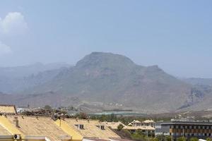 Mount Teide and the roofs of the houses. photo