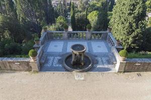 A small round fountain at Villa d'este in Tivoli. photo