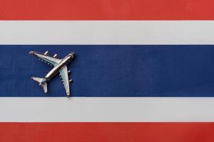 The plane over the flag of Costa Rica, the concept of travel. photo