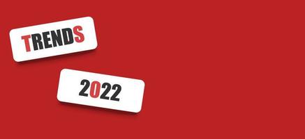 2022 tendencias sobre un fondo rojo. estrategia de negocio e idea creativa. vector