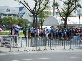 BANGKOK THAILAND31 DECEMBER 2018 A large group of tourist groups on the last day of the year are waiting to board a bus in Bangkok of Thailand. photo