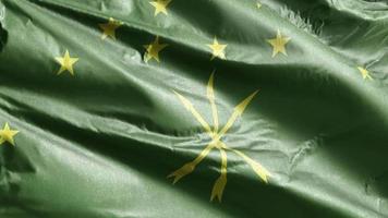 bandeira têxtil adygea acenando lentamente no loop de vento. bandeira adyghe balançando suavemente na brisa. tecido tecido têxtil. fundo de preenchimento completo. Ciclo de 20 segundos. video