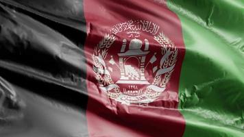bandiera dell'Afghanistan che sventola sul circuito del vento. bandiera afghana che ondeggia nella brezza. sfondo di riempimento completo. Ciclo di 10 secondi.