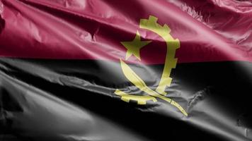 bandiera dell'Angola che ondeggia lentamente sul ciclo del vento. bandiera angolana che ondeggia dolcemente sulla brezza. sfondo di riempimento completo. Ciclo di 20 secondi.