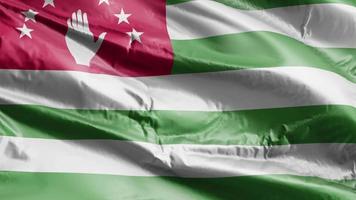 bandiera dell'abkhazia che sventola nel vento. bandiera della brezza abkhazia che ondeggia. sfondo di riempimento completo. Ciclo di 10 secondi. video
