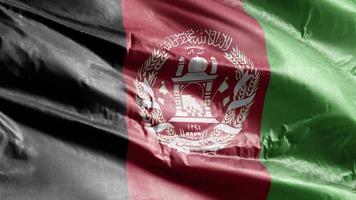 afghanistan textiel vlag zwaaien op de wind-lus. Afghaanse banner zwaaiend op de wind. stof textiel weefsel. volledige vulling achtergrond. 10 seconden lus. video