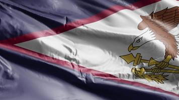 drapeau des samoa américaines agitant sur la boucle du vent. bannière des samoa américaines se balançant sur la brise. fond de remplissage complet. Boucle de 10 secondes. video