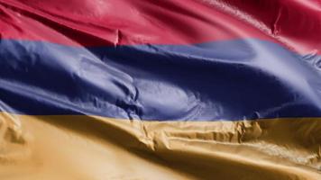 Armenië vlag zwaaien op de wind-lus. Armeense banner zwaaiend op de wind. volledige vulling achtergrond. 10 seconden lus. video