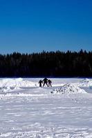 winter in Manitoba - learning to skate on a frozen lake photo