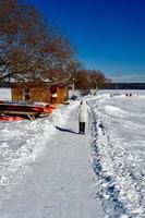 winter in Manitoba - walking on a snow covered path photo