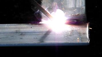 Close-up Welding of steel produces light. Causing sparks that are not good for the eyes. video