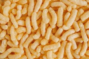 Corn sticks as background texture image. Top view. Place for your text photo