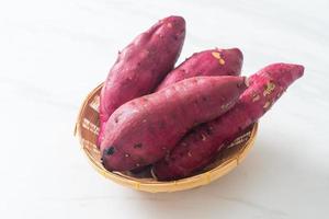 Japanese sweet potatoes on basket photo