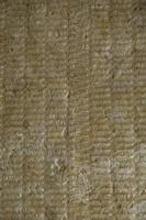 Mineral wool for insulating the walls as a background image texture. Top view. Copy, empty space for text photo