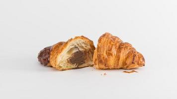 croissant with cream filling on a white background photo