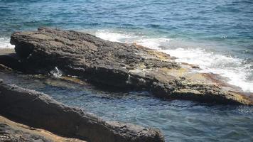 Liguria Italy sea Shore rocks and Beach - summer day video