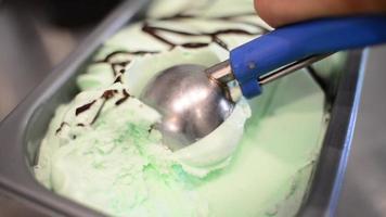 Close Up Mint Ice Cream Scooping Out Of Container video