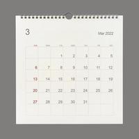 March 2022 calendar page on white background. Calendar background for reminder, business planning, appointment meeting and event. photo