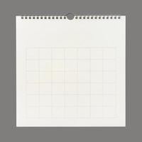 White calendar paper background with grid line of table. Wall calendar on gray background. photo