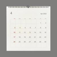 April 2022 calendar page on white background. Calendar background for reminder, business planning, appointment meeting and event. photo