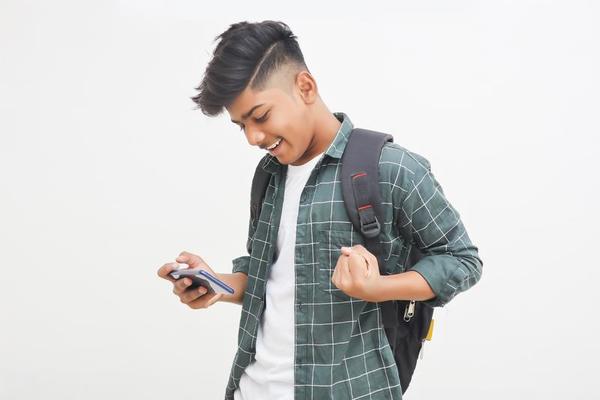 Student With Phone Stock Photos, Images and Backgrounds for Free Download
