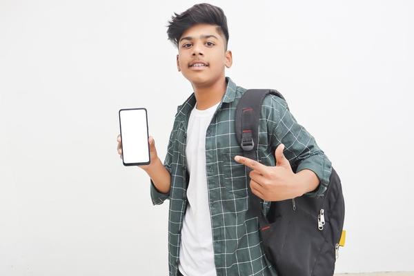 Student With Phone Stock Photos, Images and Backgrounds for Free Download