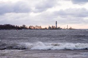 Thunder storm waves crashing on the beach photo