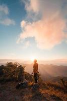 Hiking in mountains in the evening photo