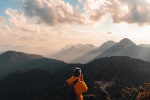 Hiking in mountains in the evening photo