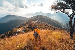 Hiking in mountains in the evening photo