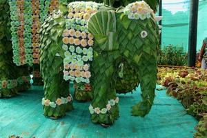 Elephant cub modelled out of plantain leaves photo