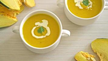 pumpkin soup in white bowl video