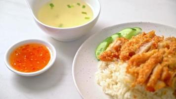 Hainanese chicken rice with fried chicken or rice steamed chicken soup with fried chicken - Asian food style video