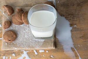 top view of sweet chocolate cookies and milk splash photo