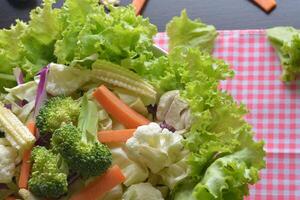 Mixed Vegetables have a carrots, broccoli, cauliflower,  Purple cabbage, lettuce - clean food concept photo