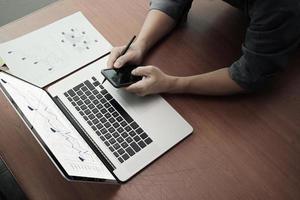 top view of Double exposure of businessman hand working with new modern computer and business strategy as concept photo