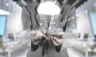 Double exposure of Businessman hand working with a Cloud Computing diagram on the new computer interface as concept photo